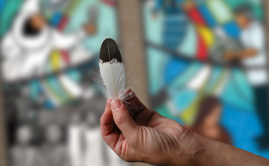 hand-eagle-feather